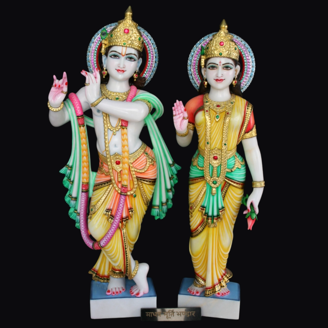 White marble Radha Krishna murti with traditional ornaments carved in Jaipur