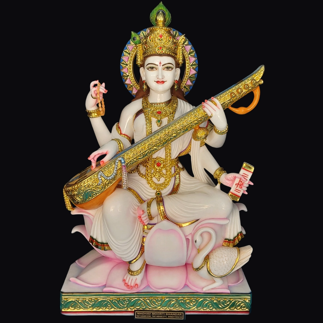 white marble Saraswati murti seated on lotus holding veena carved in jaipur